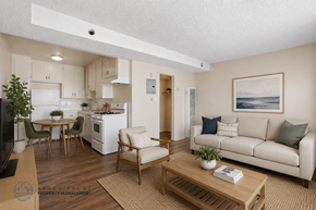 Lennox apartment for rent - A living room with a couch, chairs, and a coffee table.