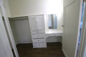 Wilmington apartment for rent - a small room with a white dresser and a mirror