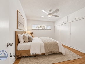Inglewood apartment for rent - A bedroom with a bed, a ceiling fan, and a rug on the floor.
