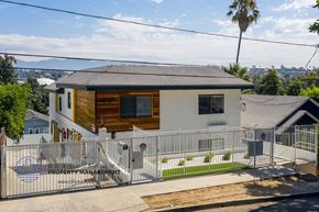 Los Angeles apartment for rent - a small house with a deck and a fence