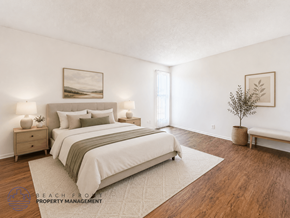 Lynwood apartment for rent - A well-lit bedroom with a large bed and a small tree.