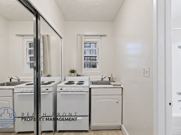 Inglewood apartment for rent - A small kitchen with a sink, stove and dishwasher.