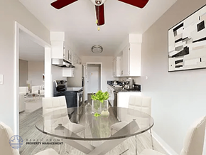 Inglewood apartment for rent - A modern kitchen with a glass table and white chairs.