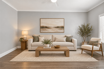 Long Beach apartment for rent - A living room with a white couch, a wooden coffee table, and a painting on the wall.