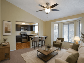 La Habra apartment for rent - A living room with a couch, chairs, and a coffee table.