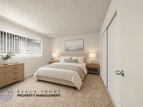 Paramount apartment for rent - A bedroom with two beds, a nightstand, and a dresser with a plant on top.