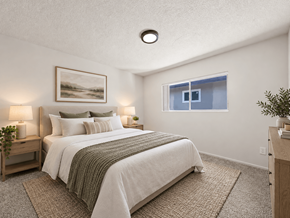 Inglewood apartment for rent - A bedroom with a large bed and a painting on the wall.