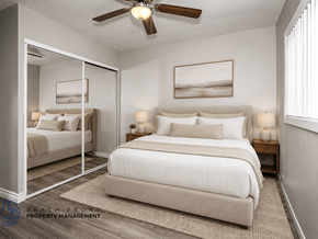 Downey apartment for rent - A bedroom with a large bed and a ceiling fan.
