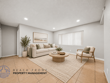 Cudahy apartment for rent - A living room with a couch, chair, and coffee table.
