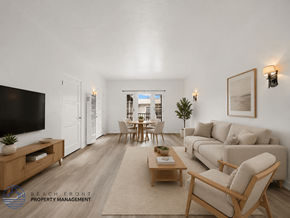 Riverside apartment for rent - A living room with a sofa, chairs, and a coffee table.