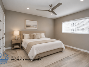 Los Angeles apartment for rent - A bedroom with a bed, nightstand, and a ceiling fan.