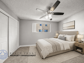 Torrance apartment for rent - A bedroom with a bed, nightstand, and a ceiling fan.