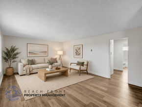 Long Beach apartment for rent - A living room with a couch, coffee table, and lamp.