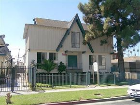 Inglewood apartment for rent - a white house with a fence in front of it