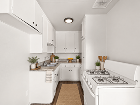 Inglewood apartment for rent - A white kitchen with a stove and sink.