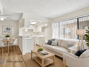 Los Angeles apartment for rent - A well-lit, modern living room with a dining area and kitchen in the background.