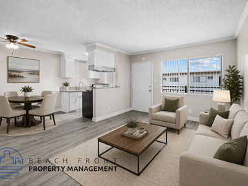 Downey apartment for rent - A living room with a dining table and chairs, a couch, and a coffee table.