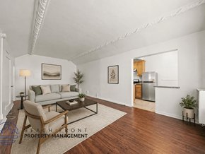 Los Angeles apartment for rent - A living room with a couch, chair, and a coffee table.