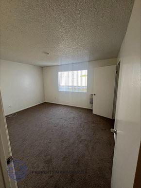 Wilmington apartment for rent - an empty room with a window and a door