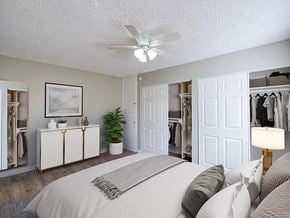 Bellflower apartment for rent - A bedroom with a bed, dresser, and closet.