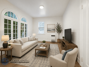 Los Angeles apartment for rent - A living room with a couch, chair, and television.