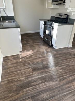 Downey apartment for rent - a kitchen with a stove and a sink