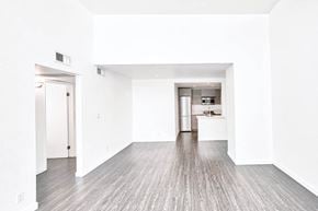 Hollywood apartment for rent - an empty living room with white walls and wood floors