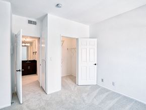 Los Angeles apartment for rent - an empty bedroom with a closet and a door to a bathroom