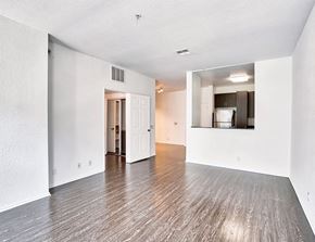 Los Angeles apartment for rent - an empty living room with white walls and wood flooring