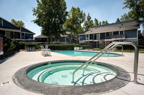 Riverside apartment for rent - A round above ground pool with a slide.