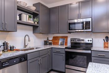 Kitchen islands with contemporary pendant lighting