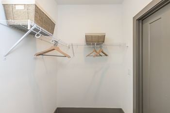 Spacious walk-in closet with built-in shelving