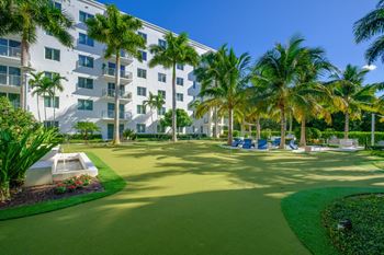 Active courtyard with fire pit, 9 hole putting green, lounge area, bbq grill area and life-size chess set