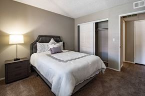 Las Vegas apartment for rent - a bedroom with a bed and a closet