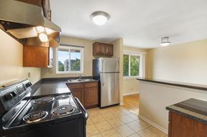 Skokie apartment for rent - Spacious kitchen with stainless steel appliances and wood cabinets