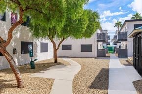 Las Vegas apartment for rent - a building with a tree in front of it