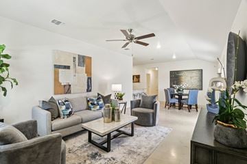 Harker Heights townhouse for rent - A living room with a grey couch and a coffee table.