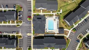 Atlanta apartment for rent - an overhead view of a parking lot with a swimming pool