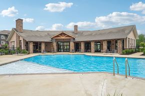 Lebanon apartment for rent - A large house with a pool in front.
