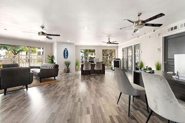 Dallas apartment for rent - a living room and dining room with couches and chairs