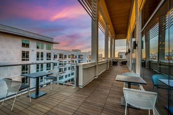 Rooftop retreat with wet bar, ping pong table, giant scrabble wall, and stunning downtown views