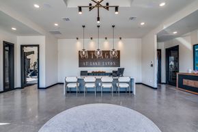 Lavon apartment for rent - A modern dining room with a large table and chairs.