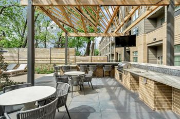 Outdoor cabana with outdoor kitchen and gas grills