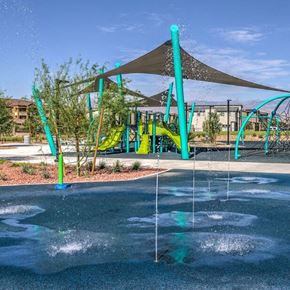 North Las Vegas apartment for rent - A playground with a water feature in the foreground.