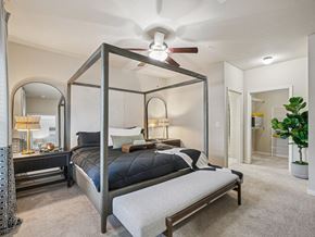 Apex apartment for rent - Luxury primary bedroom with modern finishes at Village at Broadstone Station apartments in Apex, NC