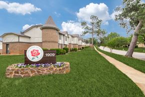 Tyler apartment for rent - our apartments are located next to a sidewalk and green grass