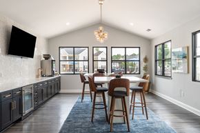 Aberdeen townhouse for rent - A dining room with a table and chairs.
