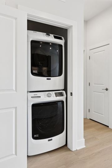 Omaha apartment for rent - A white double oven built into a kitchen cabinet.