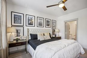 Franklin apartment for rent - A bedroom with a large bed and a ceiling fan.