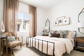Phoenix apartment for rent - a bedroom with a bed and a chair and a window